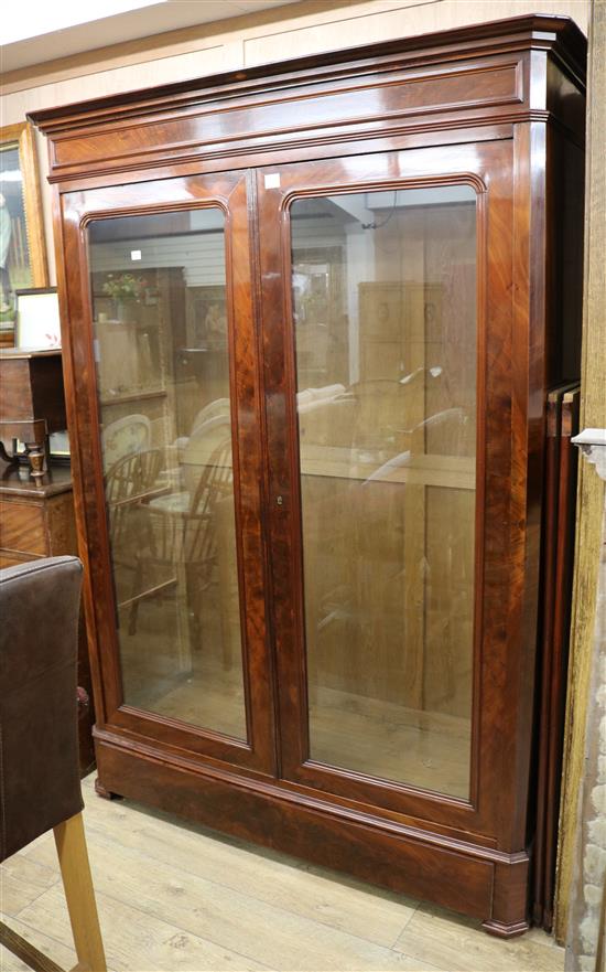 A 19th century French mahogany two door glazed bookcase W.156cm, H.216cm